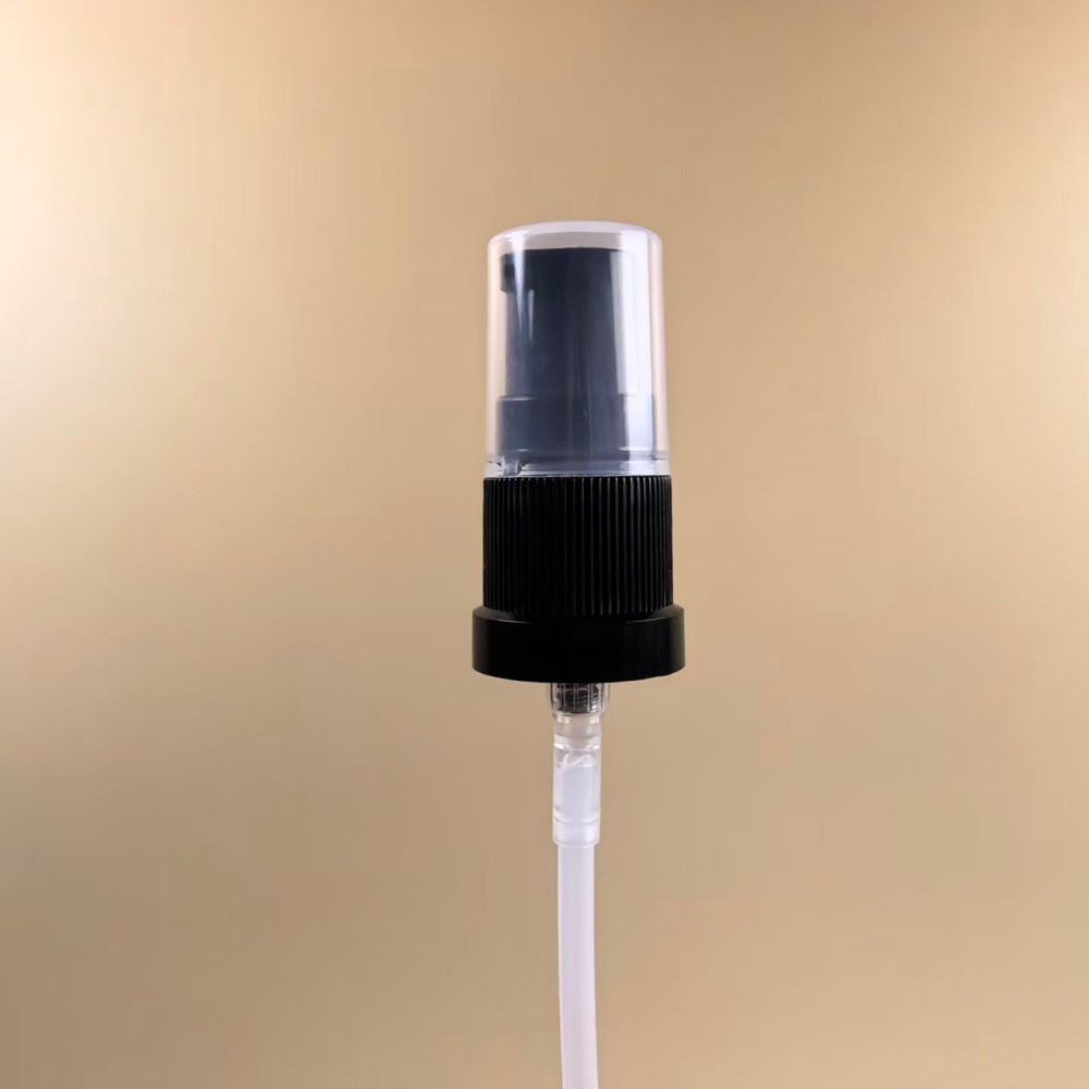 Black ribbed 18/415 essential oil pump with 0.4cc dosage for thick essential oil packaging