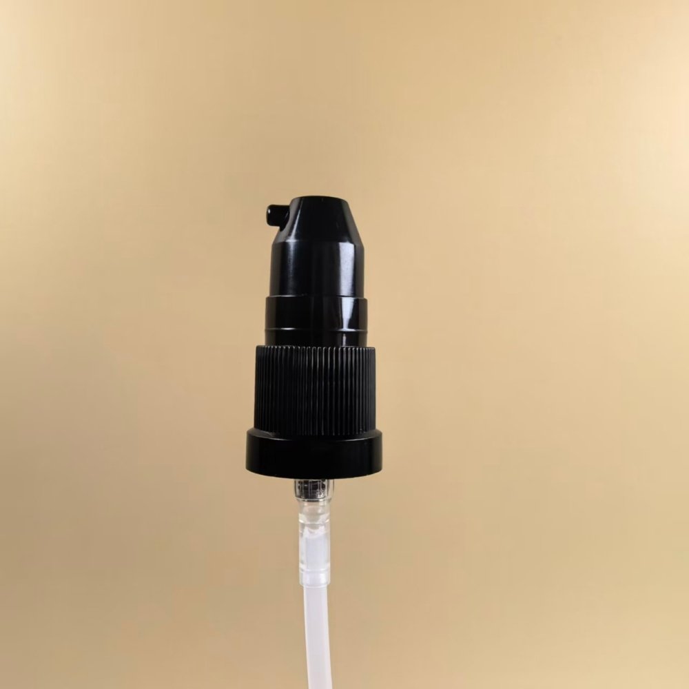 Black ribbed 18/415 essential oil pump with 0.4cc dosage for thick essential oil packaging